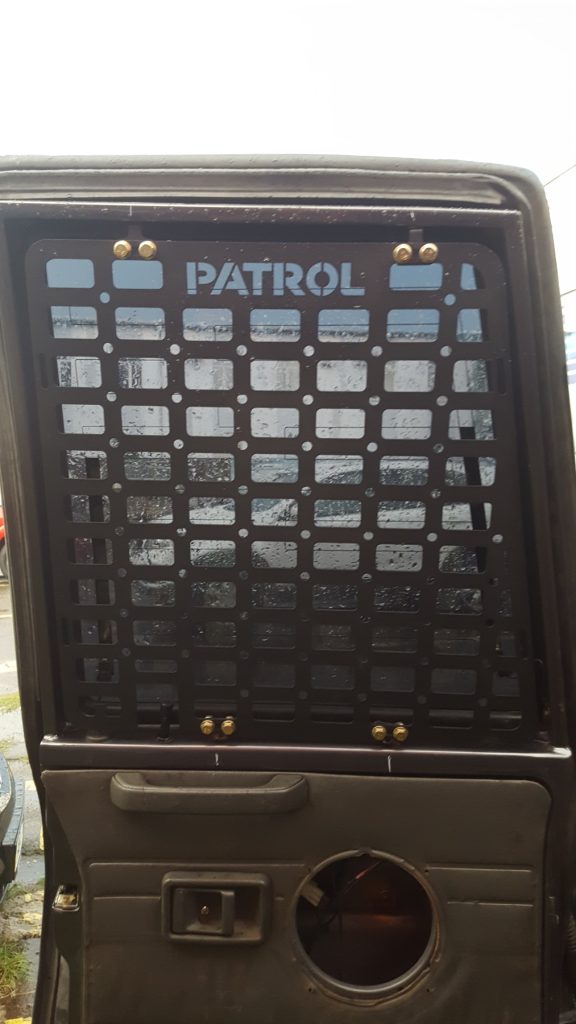 Molle (Молле) панель для дверей багажника Nissan Patrol Y61